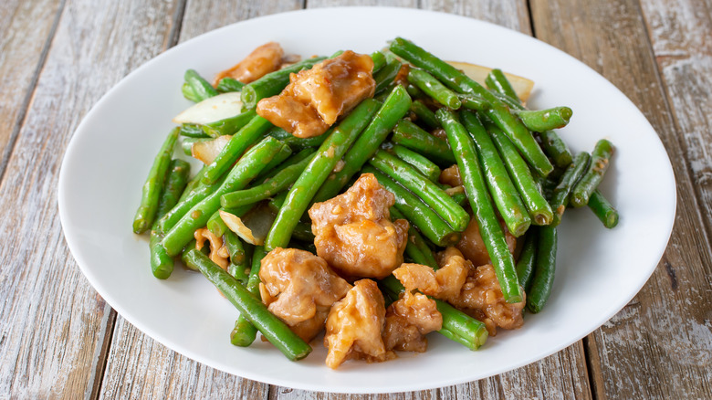 plate of string beans and chicken