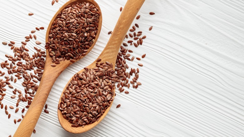 wooden spoons with flaxseed