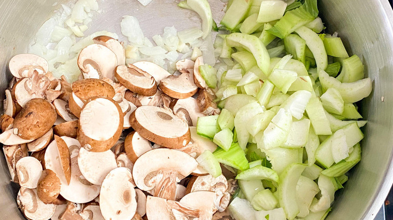 sautéing vegetables in pot