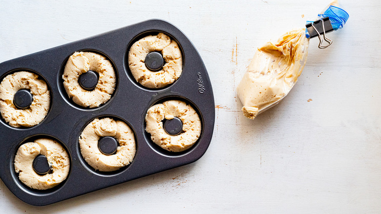 donut batter in donut pan