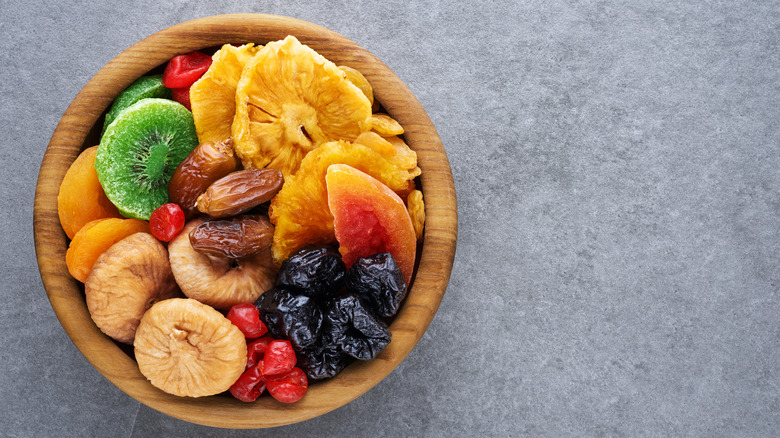 a bowl of assorted dried fruits