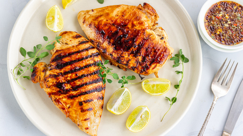 marinated chicken breasts on plate