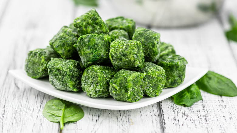 frozen spinach cubes on plate