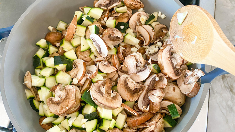 vegetables cooking in a pan