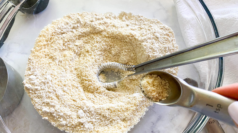 pizza dough ingredients in mixing bowl