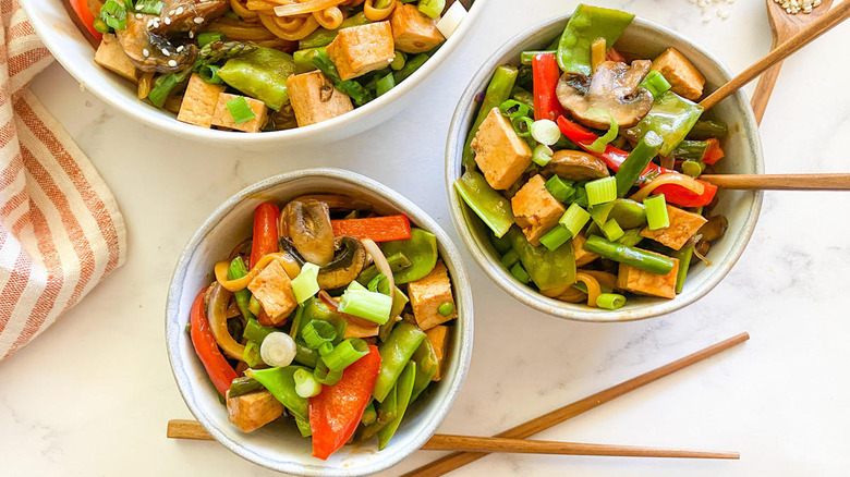 stir-fried vegetables in bowls