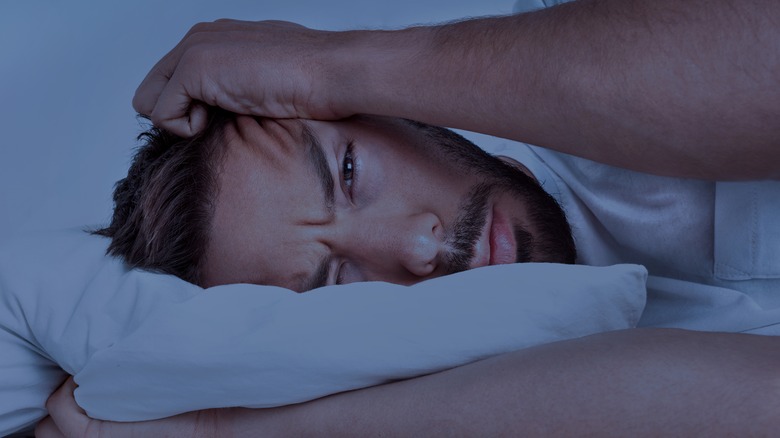 man unable to sleep at night