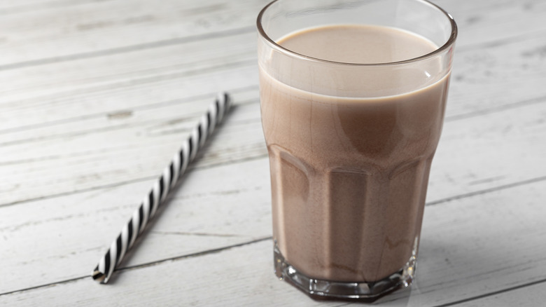 glass of chocolate milk with a straw