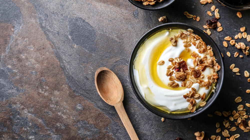 bowl of oatmeal with yogurt and honey