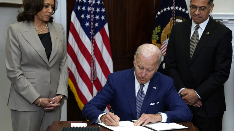 Biden signing the executive order