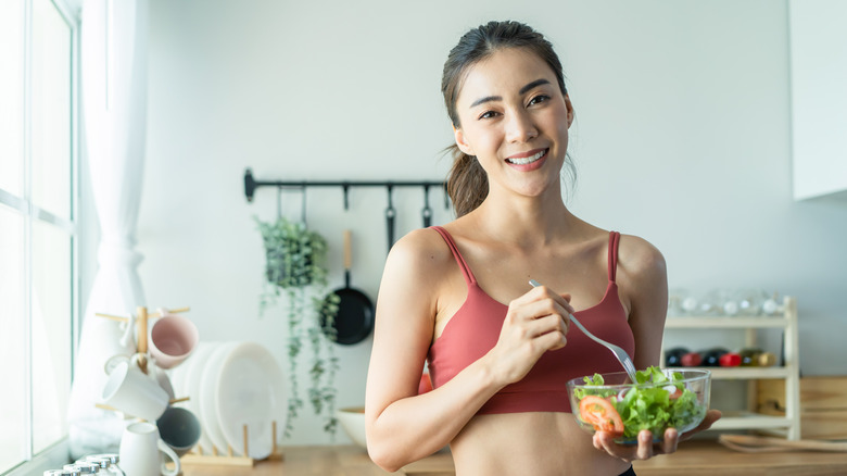 girl eating salad