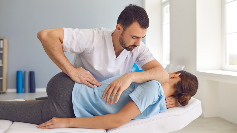 osteopath performing a treatment