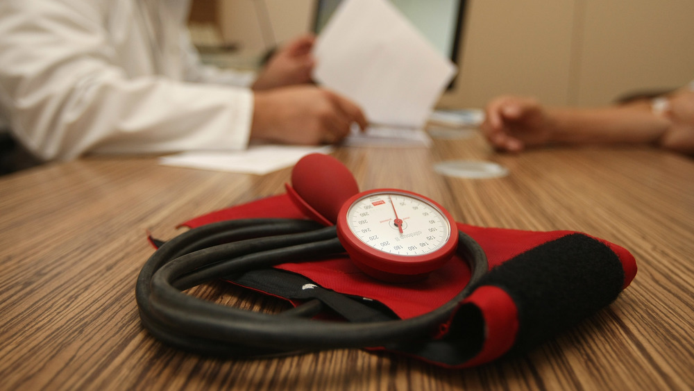 Blood pressure meter on desk