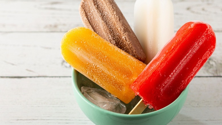 Different popsicles in a bowl