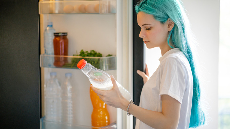 Woman storing milk