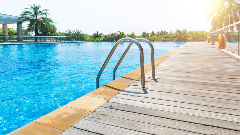 ladder entrance into a swimming pool 