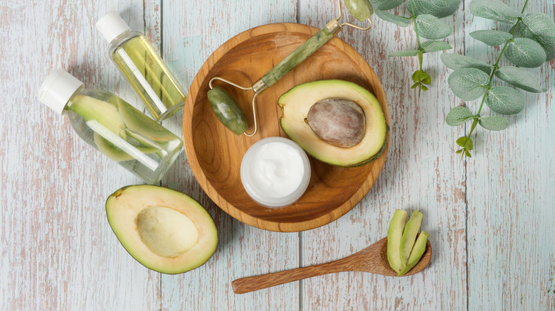 Avocado on wooden plate