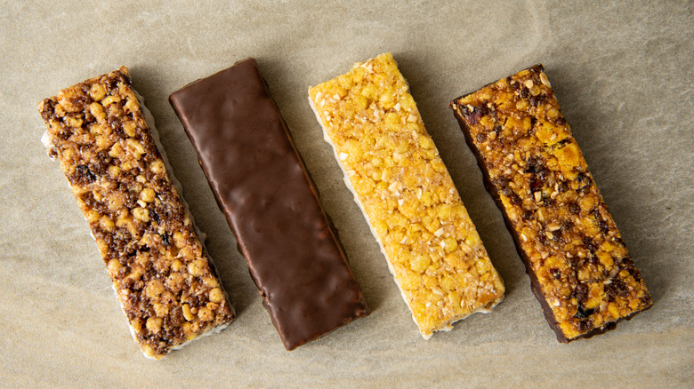 Four different granola bars on a table