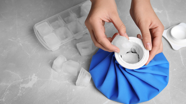 putting ice cubes in ice pack