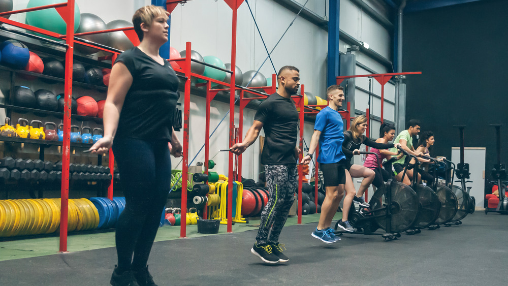 People jumping rope, riding bikes