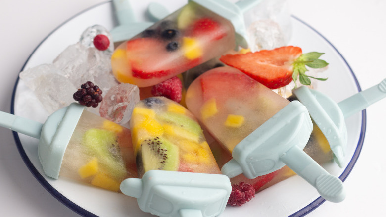 Homemade Fruit Popsicles on ice