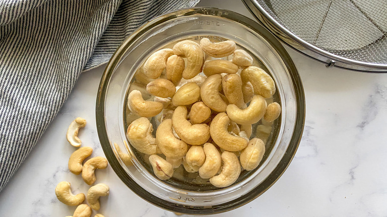 raw cashews in colander