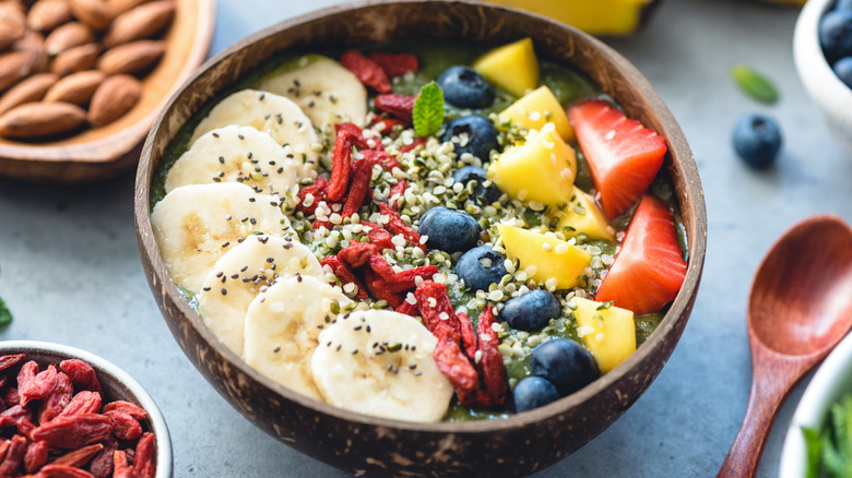 bowl of fruit topped with chia seeds