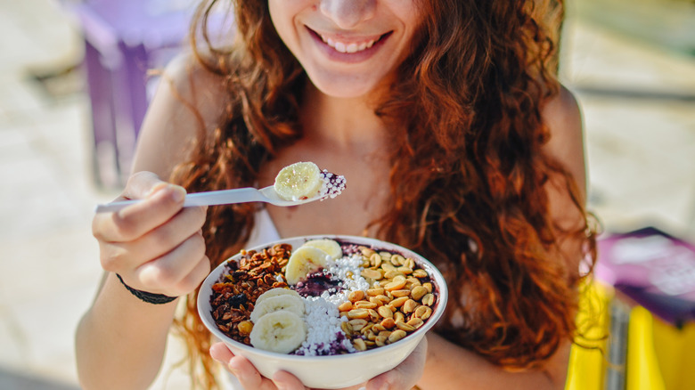 Woman eating oatmeal