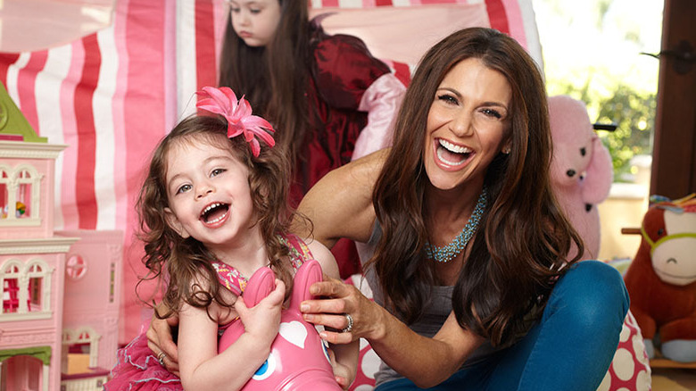 Samantha Harris laughing with her children