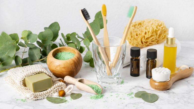 eucalyptus oil, eucalyptus leaves and tooth brushes