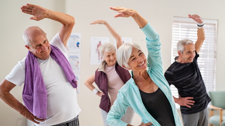 Seniors exercise at home