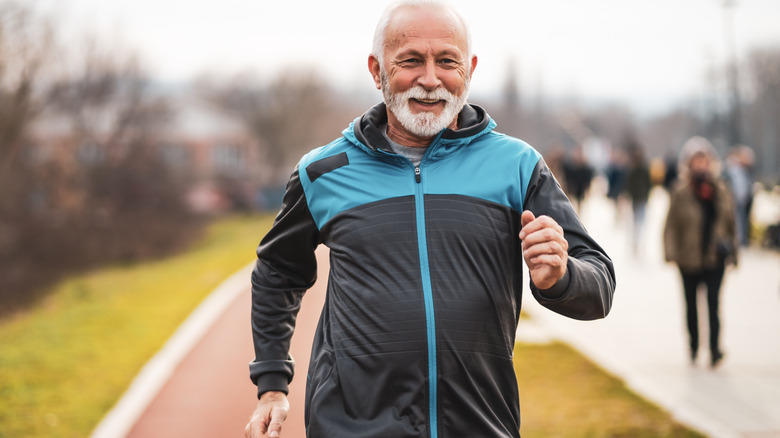 An older man jogging
