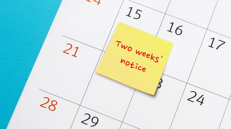 Yellow post-it saying "Two weeks' notice"