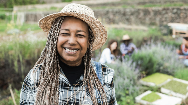 smiling woman gardening