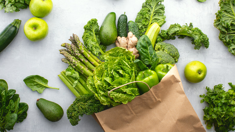 Grocery bag with leafy greens