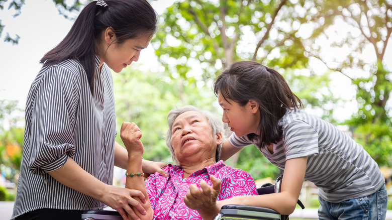 older woman having a seizure