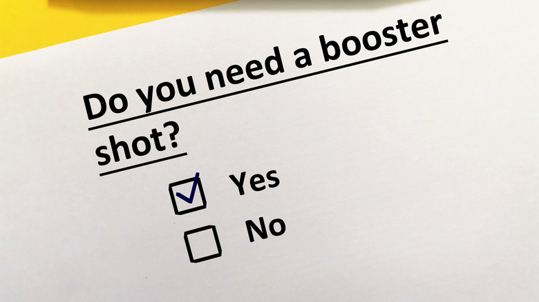 Questionnaire with yes or no check mark question about booster shot