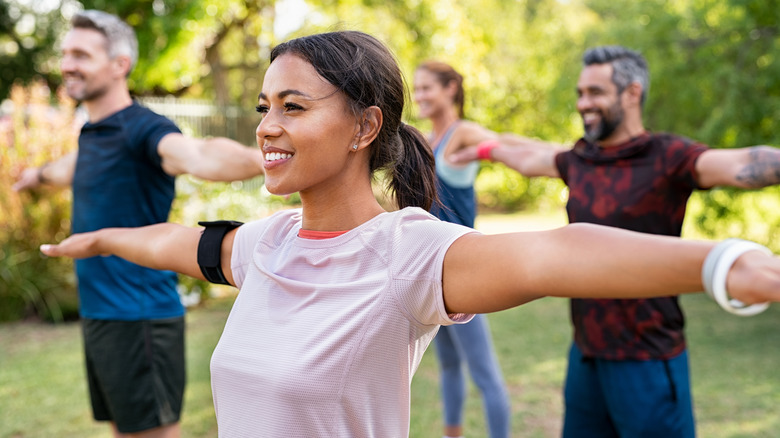 people exercising outside