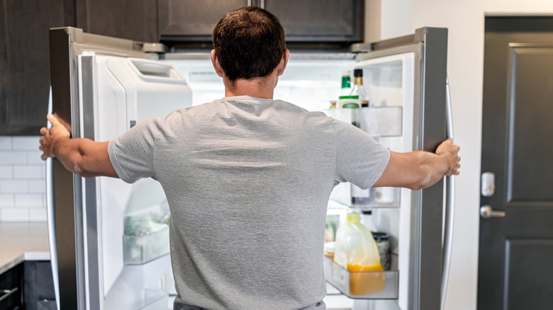 Man looking in the refrigerator