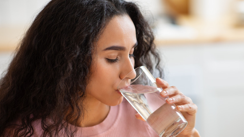 Woman drinking a glass of water