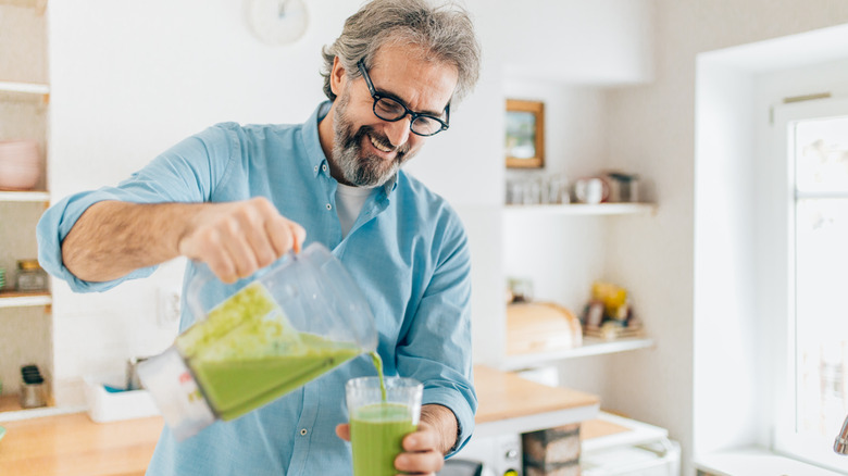 a man drinking a smoothie with collagen