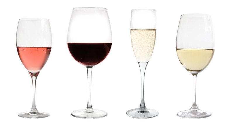 Four glasses of different wines