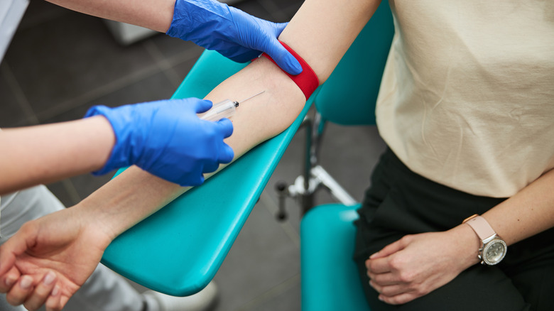 Woman getting blood work done
