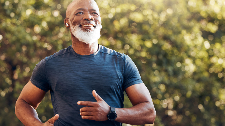 happy man jogging outdoors