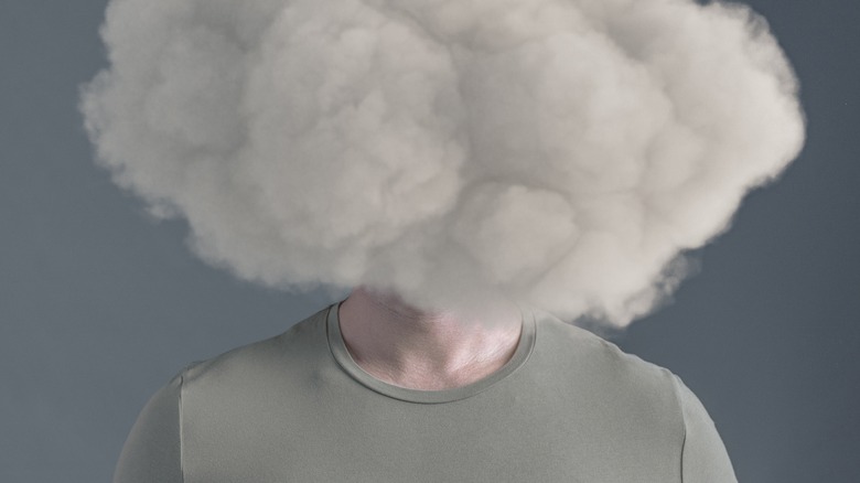 Man with cloud/fog around his head