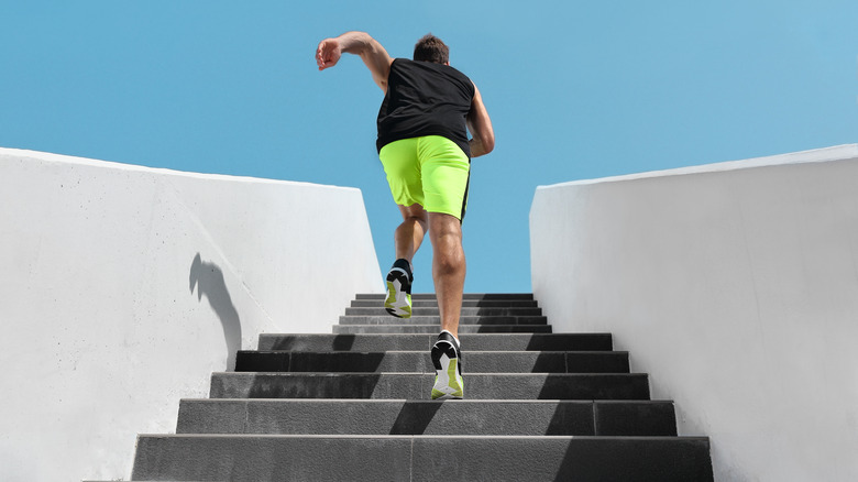 a man runs up the stairs 