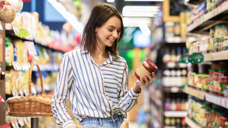 Young woman shopping in grocery store