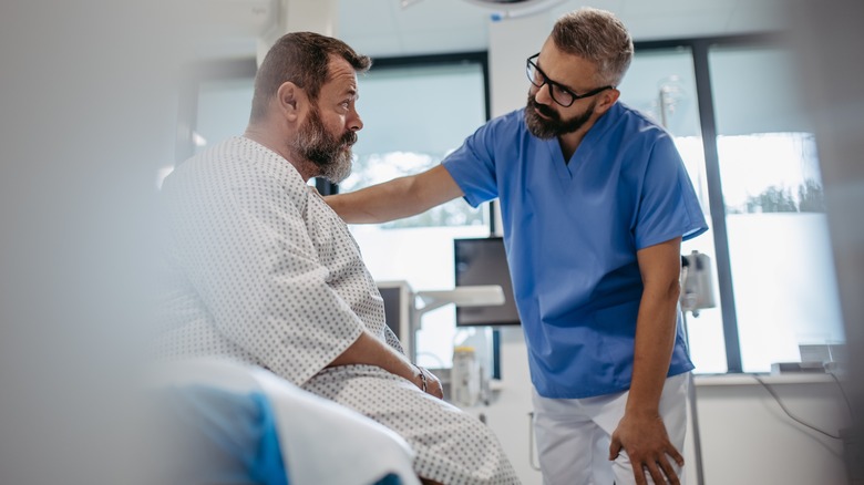 man getting emergency medical treatment