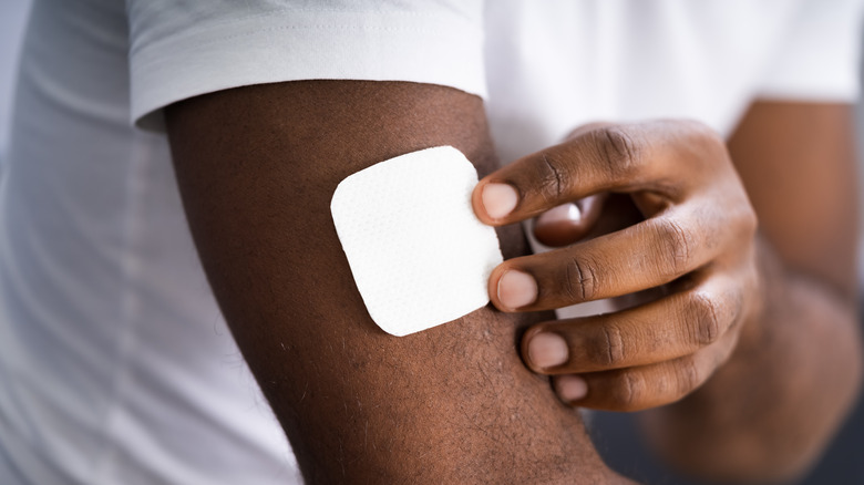 man wearing nicotine patch