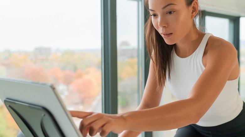 woman on exercise bike